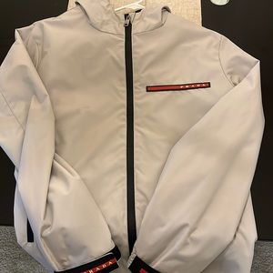 Prada raincoat used light and thiner